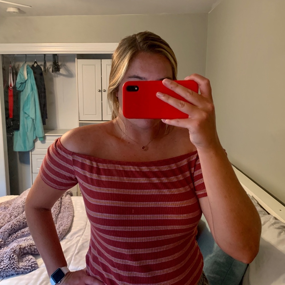 Off the shoulder striped shirt.
